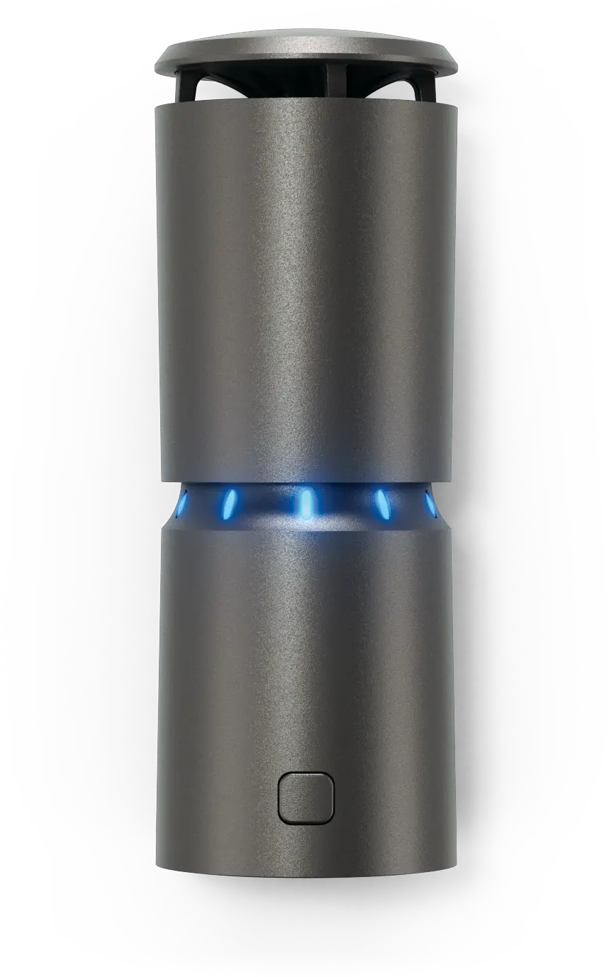 A tall, cylindrical electronic device with blue lights in darkness.